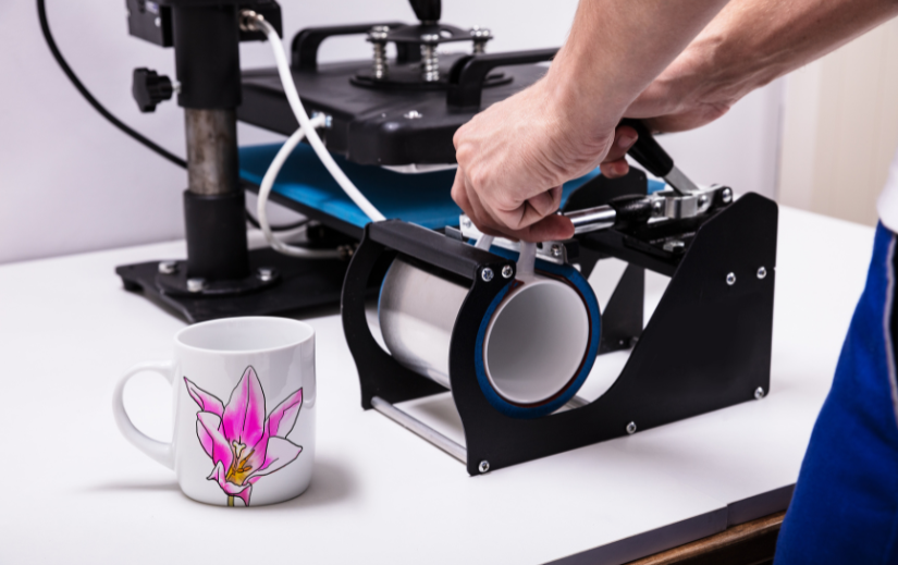 Person using a mug heat press for custom printing, a great option for low-cost side hustles in personalized product sales.